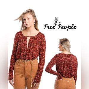 Free People Kaya Printed Keyhole Bodysuit — size Large.